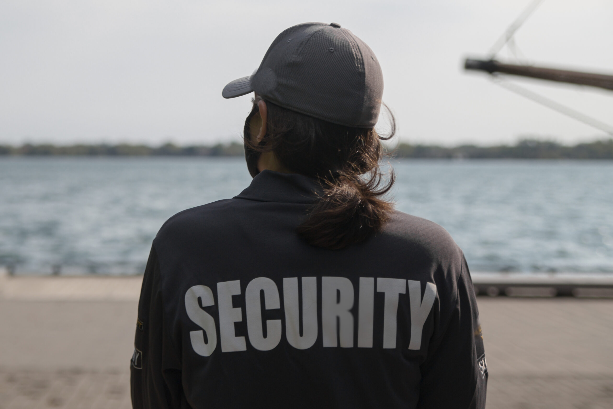 closeup-shot-of-a-female-security-guard-in-uniform-2025-02-09-01-52-00-utc-scaled